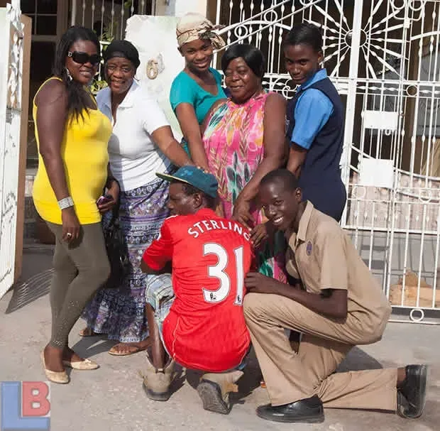 Raheem Sterling Family Photo. Here, Nadine Clarke Sterling (his Mum) takes a photo with his relatives in Jamaica.