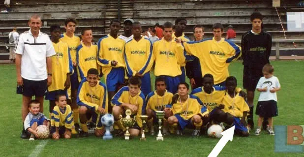 Small but Mighty was his nickname in his early days. The kid on the far right looks IN SHOCK at the small kid who helps his team win trophies.