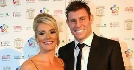 Amy Fletcher and James Milner pose for a photo.