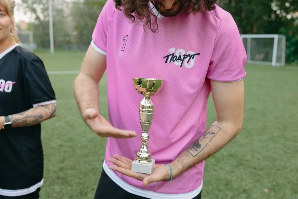 Illustrative stock photo: soccer trophy celebration