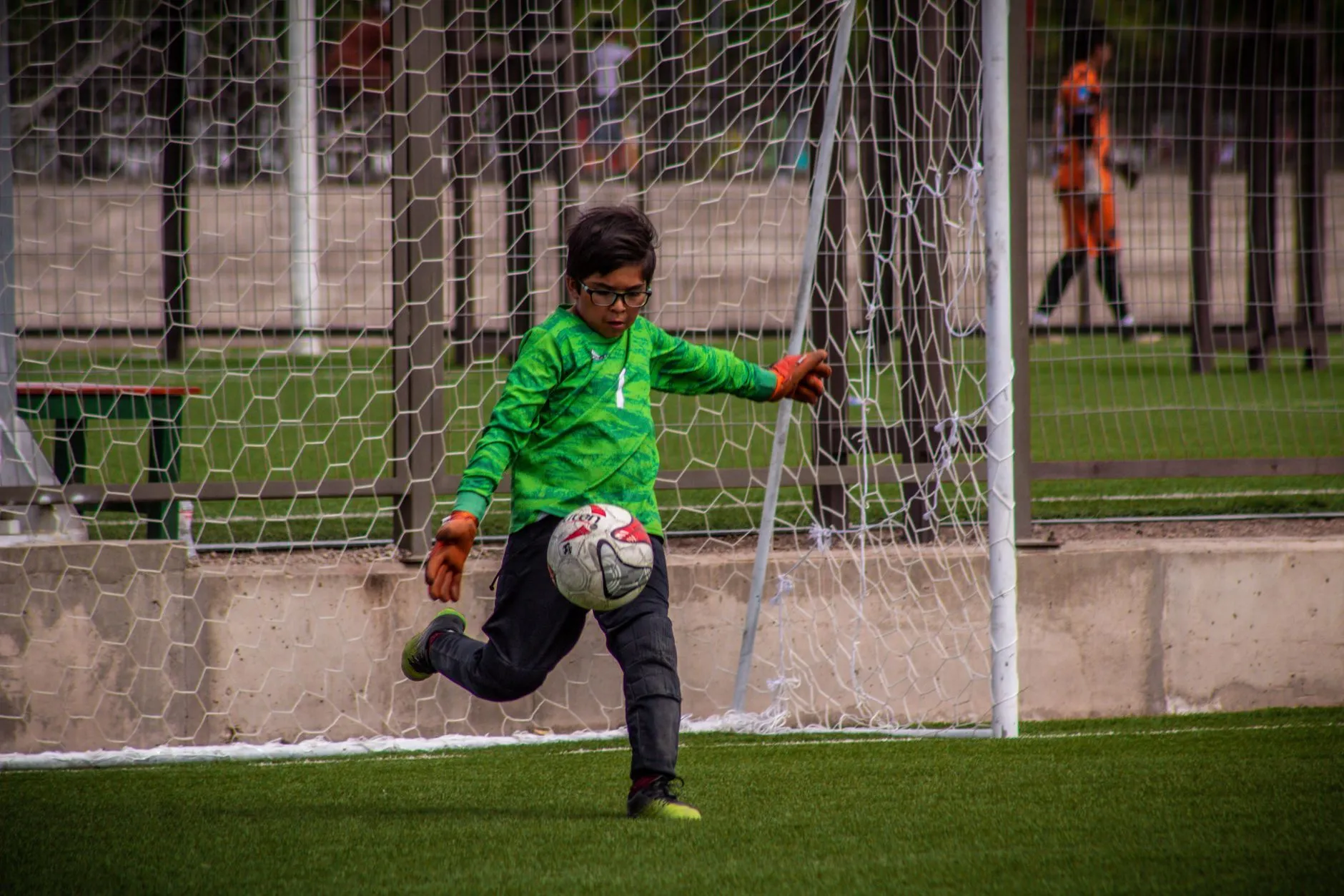 Illustrative stock photo: child playing soccer