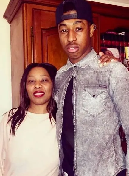 The French footballer takes a photo with his Mother.