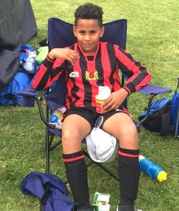 Jalen Lascelles takes a break after playing intensive football.