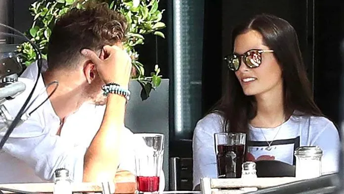 Leon Goretzka and Mathea Fischer having dinner together.