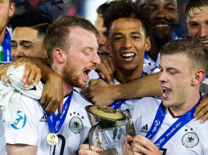 A victorious moment for Thilo Kehrer and his German U21 teammates. They basked in the glory of their hard-earned trophy triumph.