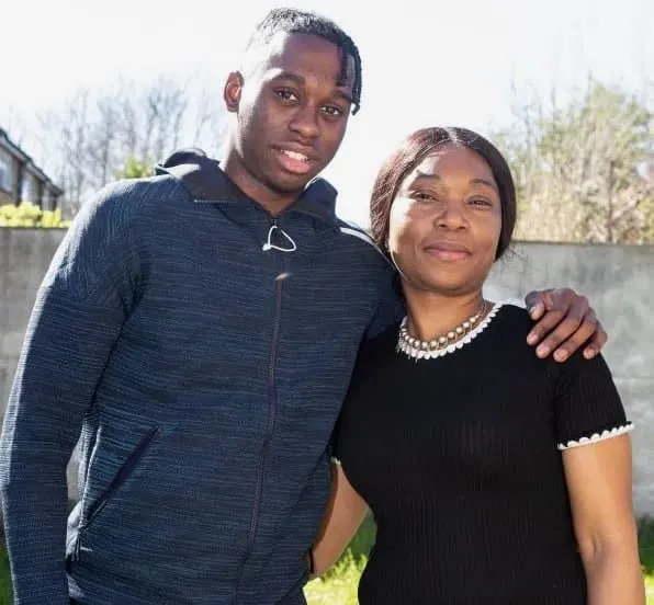 Aaron Wan-Bissaka with his mother Elizabeth. Credit: The Sun.