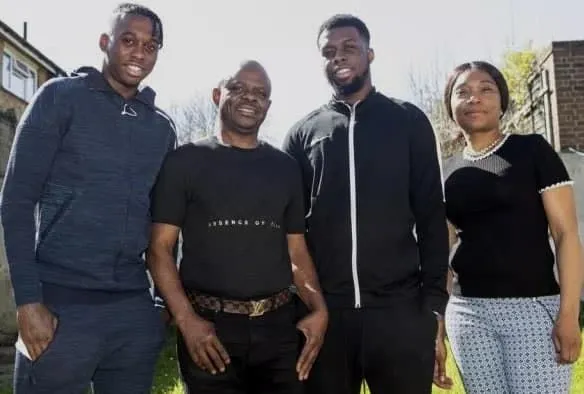 Aaron Wan-Bissaka brother Kevin spotted 2nd from right in the Family photo. Credit: The Sun.