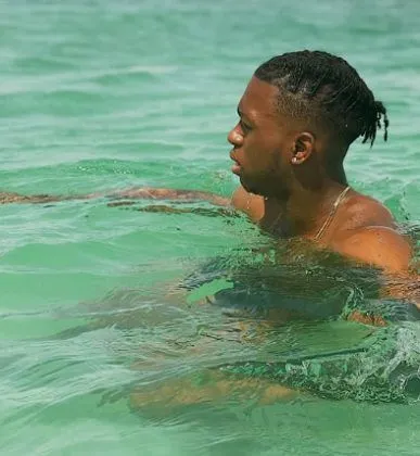 Swimming is one of Wan-Bissaka's pastime activities. Credit: Instagram.