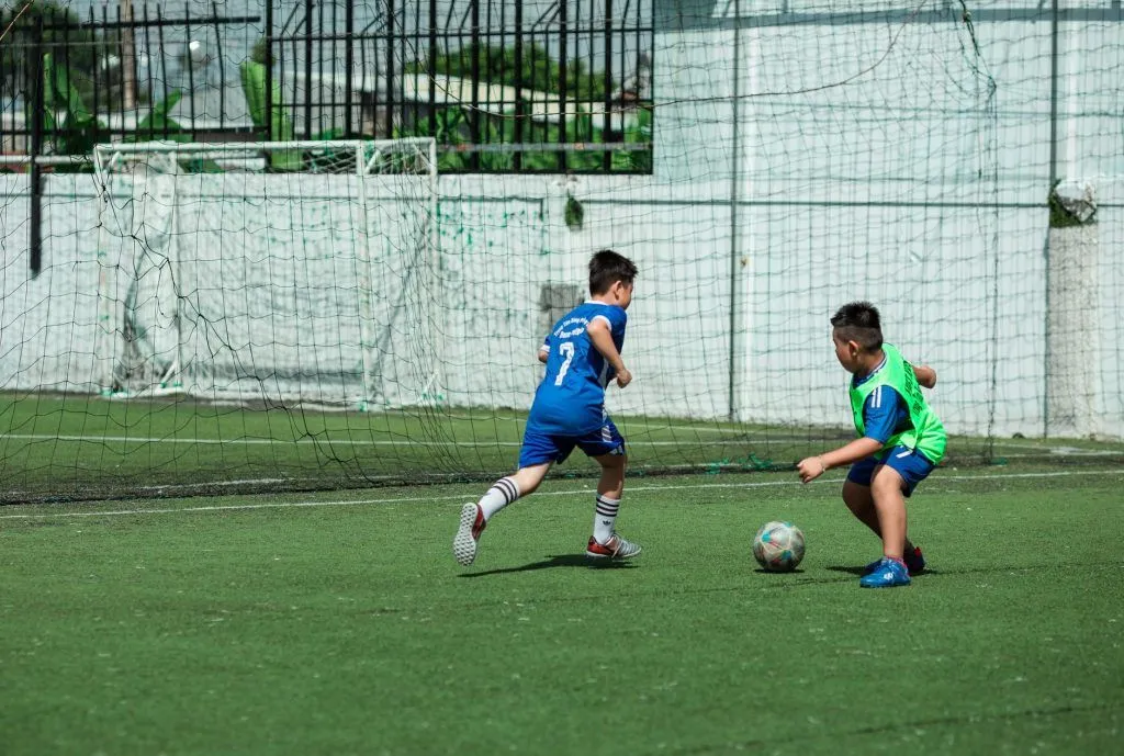 Illustrative stock photo: parent child soccer