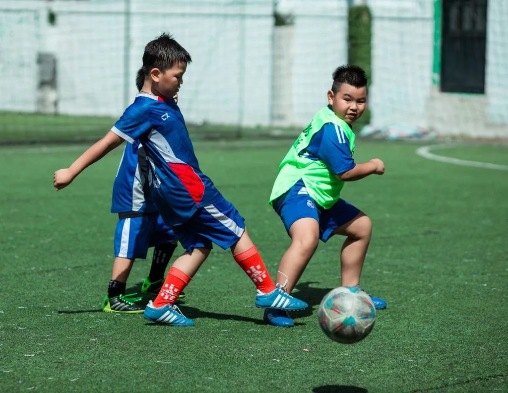 Illustrative stock photo: parent child soccer
