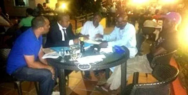 Victor Osimhen's Dad (second from right), his son and Noga Sports Management team.