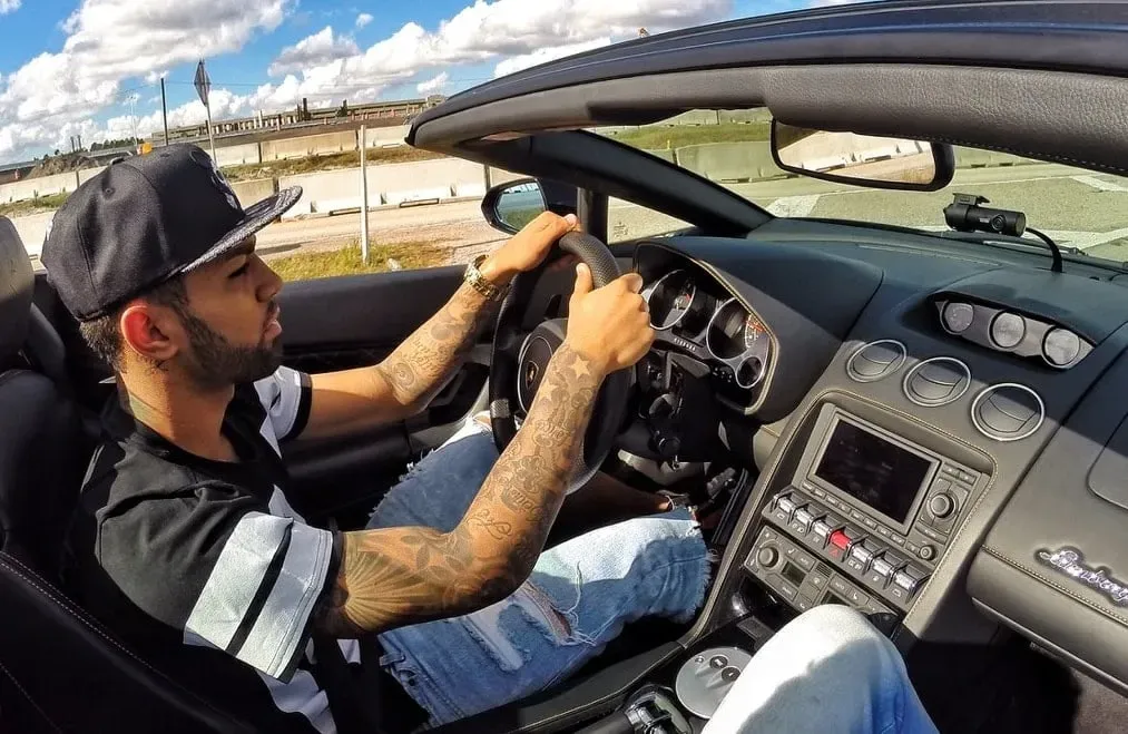 Gabriel Barbosa cruising in his decent convertible car.