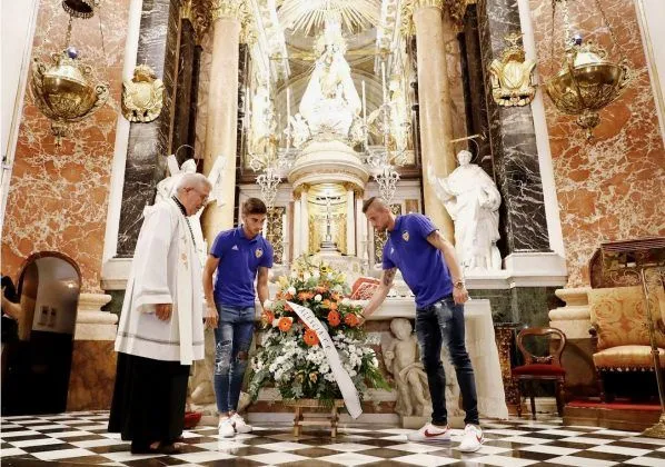 He can be seen here laying flowers near the statue of the Virgin Mary. Image Credit: Instagram.