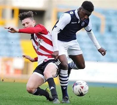 A rare photo of him playing for Millwall F.C Image Credit: Instagram.