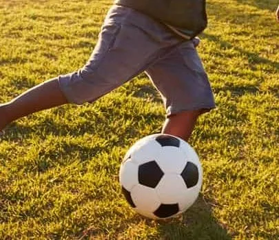 The then football prodigy did often play football with his friends after school. Cred: Pinterest.
