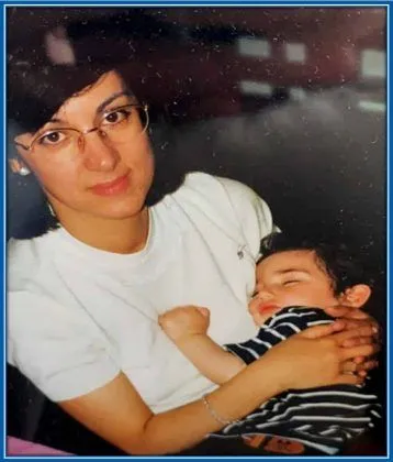 A rare childhood photo of young Goncalo Guedes with one of his parents. 📷: Instagram.
