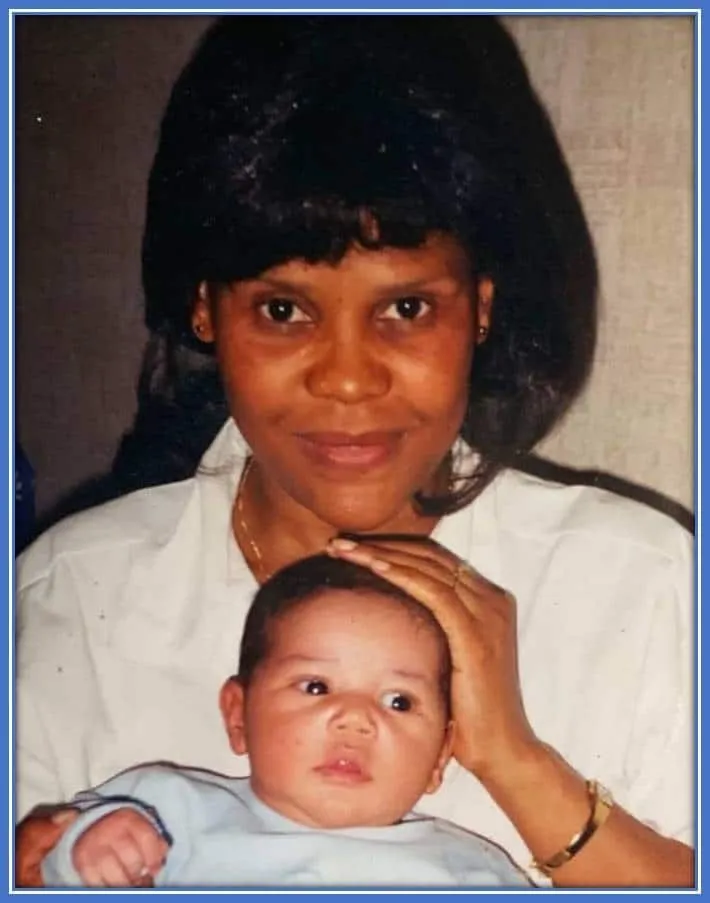 A rare childhood photo of William Saliba enjoying the warmt of his mum.