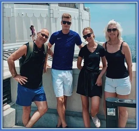 Can you spot the strker's parents 