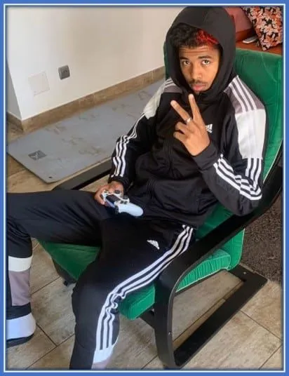 He must be very good at playing video games.
