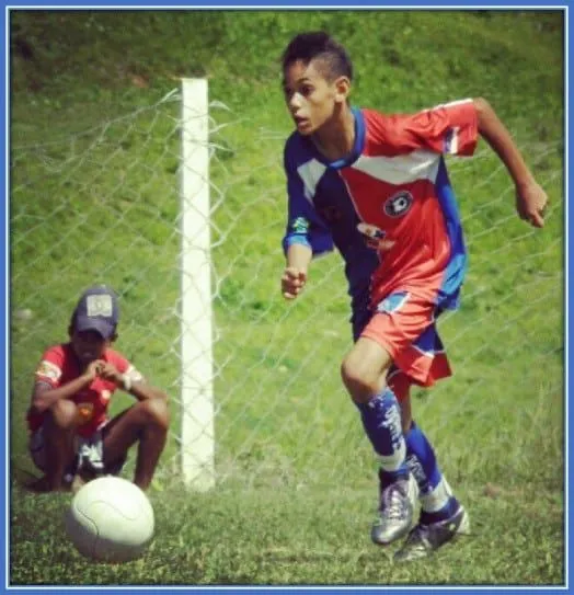 See the then teenager doing what he knows how to do best.