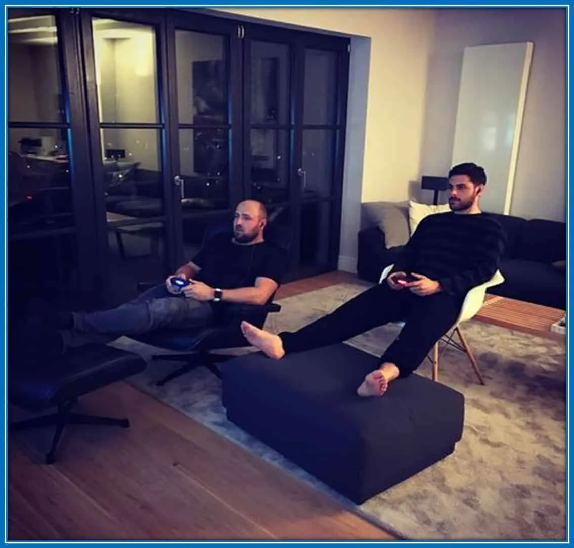 Volley on the Playstation with his friend.