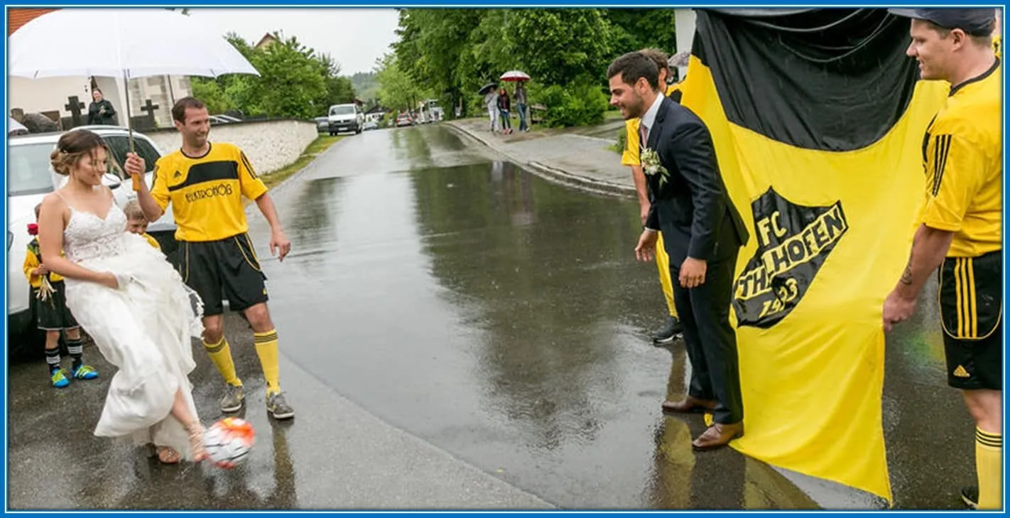 What a humble woman she is. Katja Fitchl played football on her wedding day.