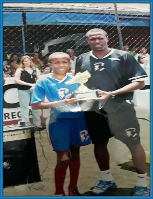 Eder Militao Early Career. He is pictured celebrating his first honour - A Golden Shoe.