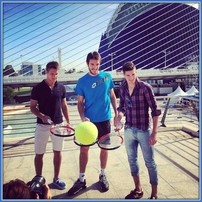 he spends some of his free periods learning how to play lawn tennis.