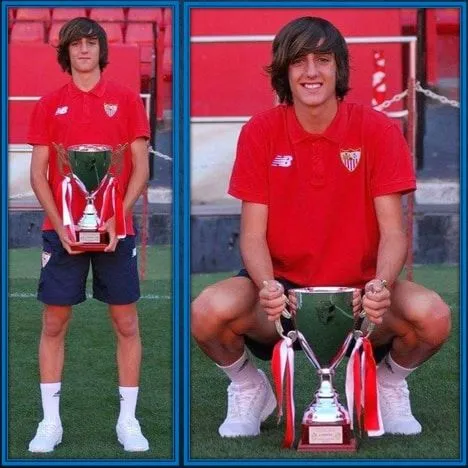 Gil holding one of his early Sevilla trophies.