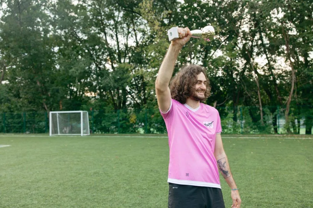 Illustrative stock photo: soccer trophy celebration
