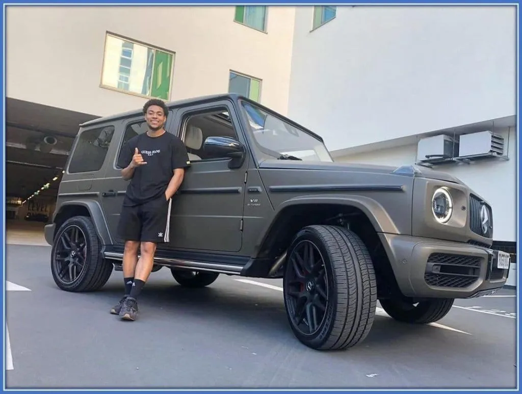 His sporting endeavour has afforded him different brands of cars. It is a beautiful sight to behold Danjuma posing beside his ride.