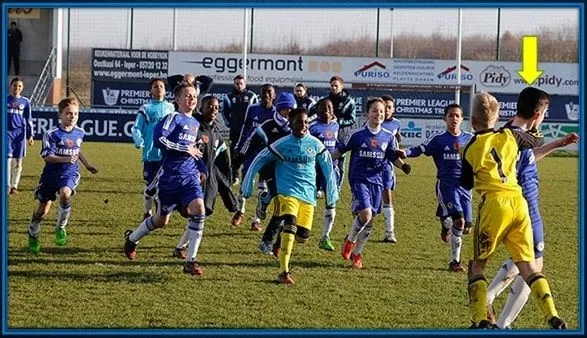 Everyone rushes to celebrate with Tino Livramento after he scored an important goal for his team.