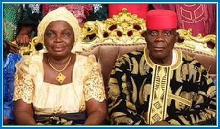 Moses Simon Parents - his look-alike Mum and a very focused Dad.