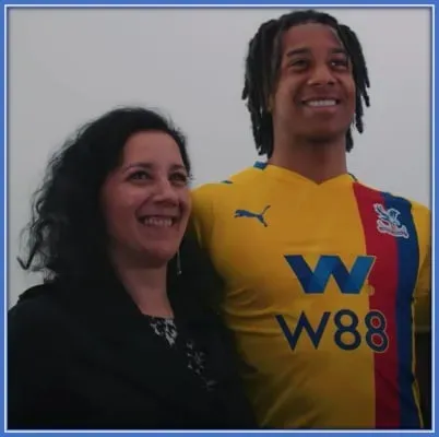 Have you noticed? Both mother and son have the same smile and looks.