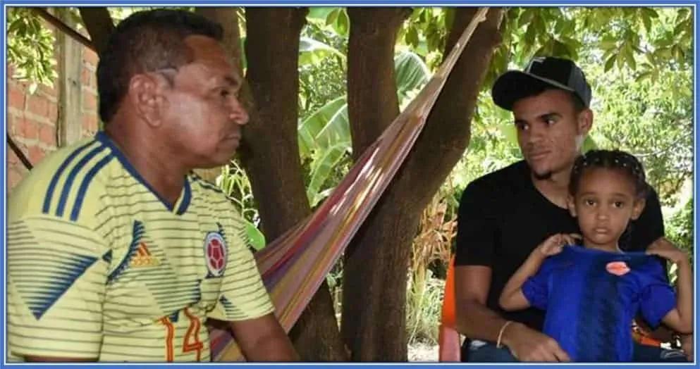 Luis Manuel D&iacute;az is a disciplinarian and a caring Dad. He appears to be having a serious conversation with his son, Luis.