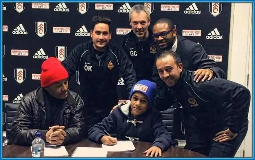 F&aacute;bio Carvalho's Father (left) is pictured alongside his son on the day he signed for Fulham academy.