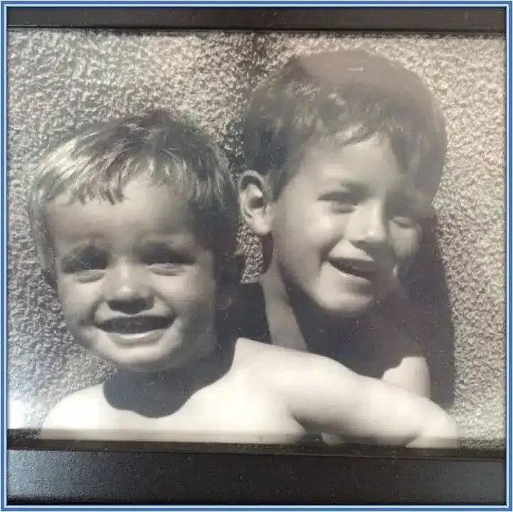 A rare childhood image of Norgaard (behind) and his cute little brother (in front).