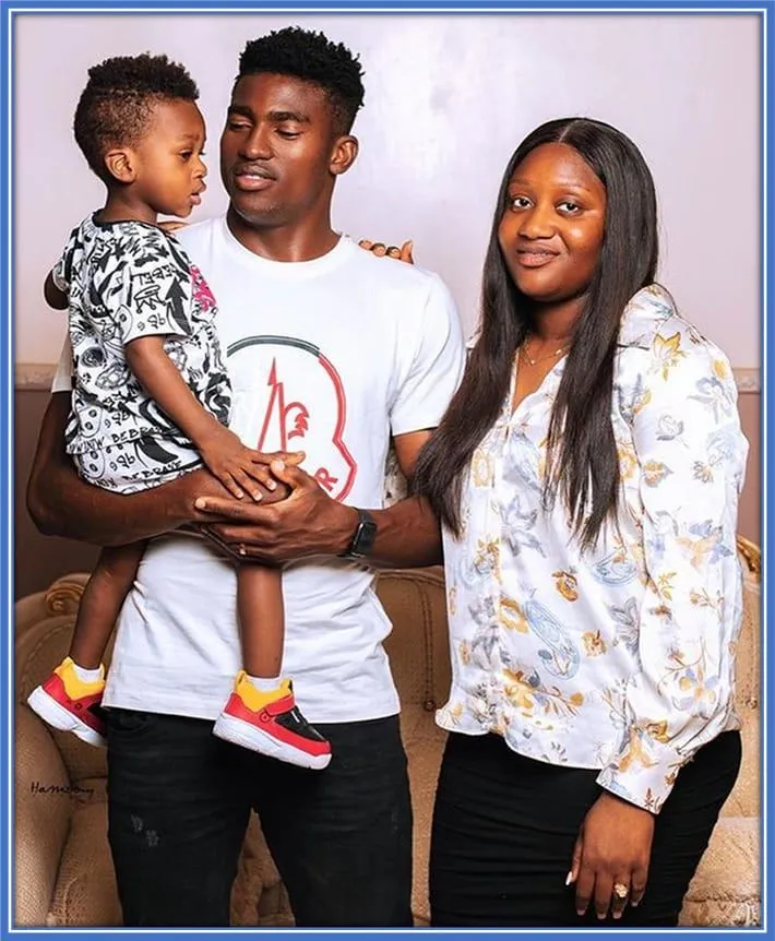 Taiwo Awoniyi's family photo - with his wife and son.
