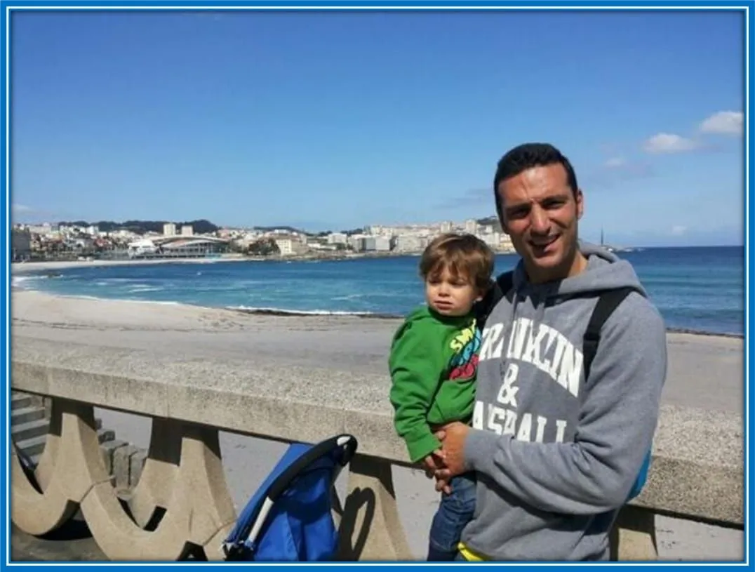 The Gaffa take a photo with his son at the seaside.