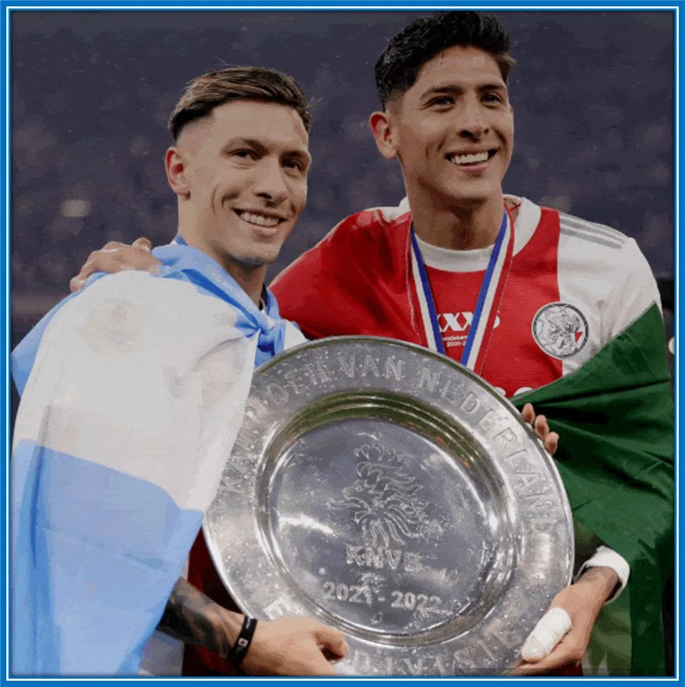 A photo of Lisandro Martinez and Edson Álvarez after a major win in 2021.