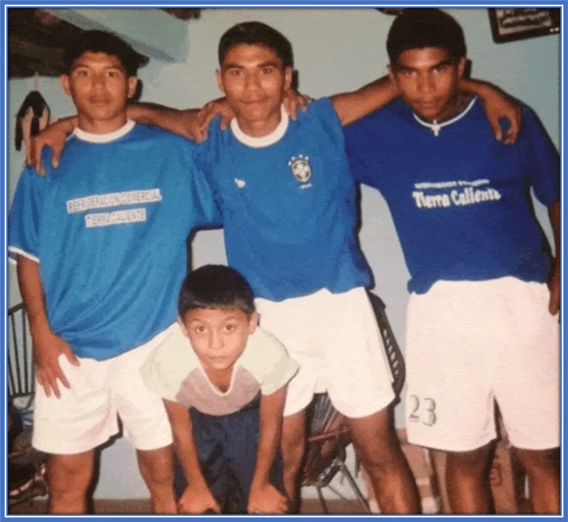 An early photo of with his teammates at the start of his career.