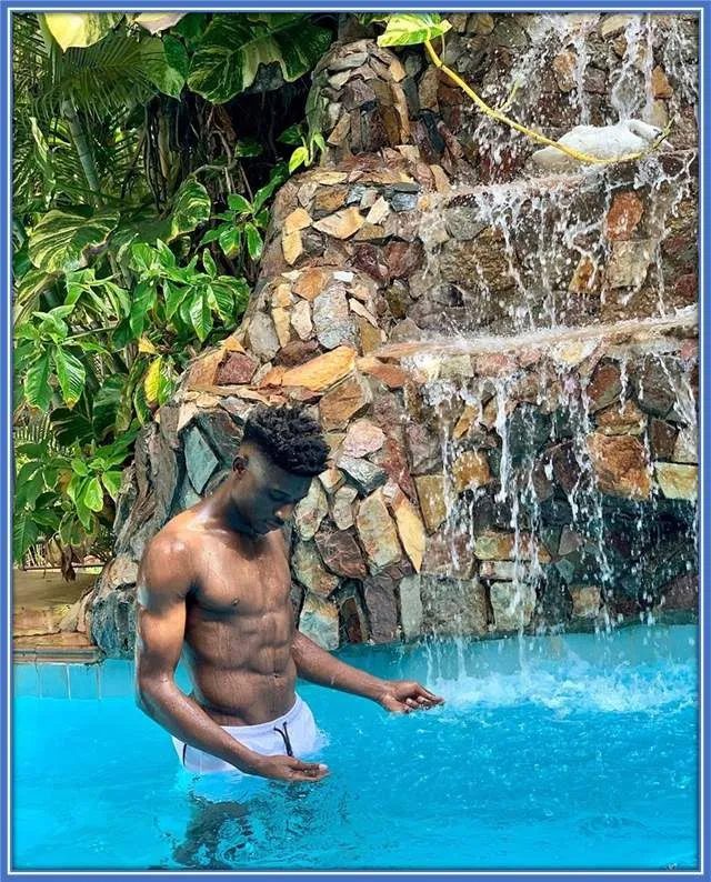 Have you noticed?... The Tattooless midfielder is built like a tank.