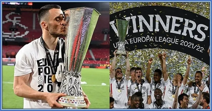 Filip Kostic kisses and celebrates the biggest trophy of his career.