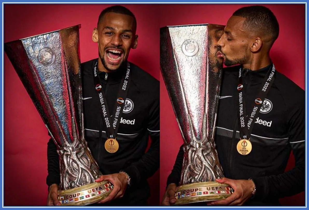 The Eintracht Frankfurt midfielder takes a photo with UEFA Championship Award.