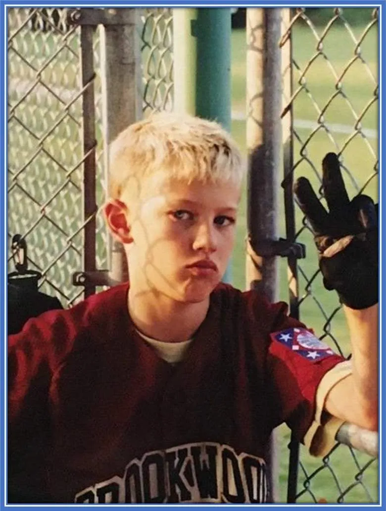 Have you noticed?... The shirt he wore reads the name of his high school, Brookwood.