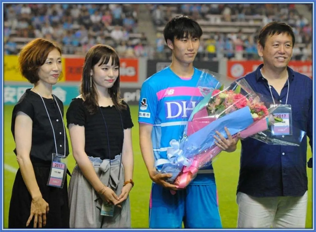 From left to right, we have; Takako (his Mum), Arisa Kamada (his wife) and Mikio (his Dad).