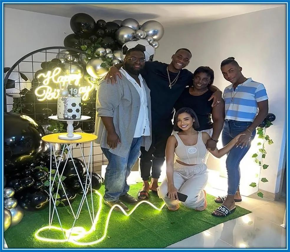 This Athlete's Mum, who has the maternal family name, Palacio, took this photo with family members. It was on the occasion of her son's 18th birthday.
