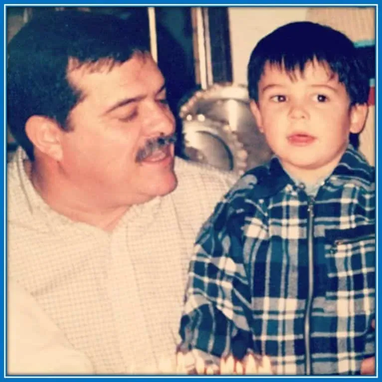 A Rare Photo of Joao in his childhood as he sits on his father's lap.