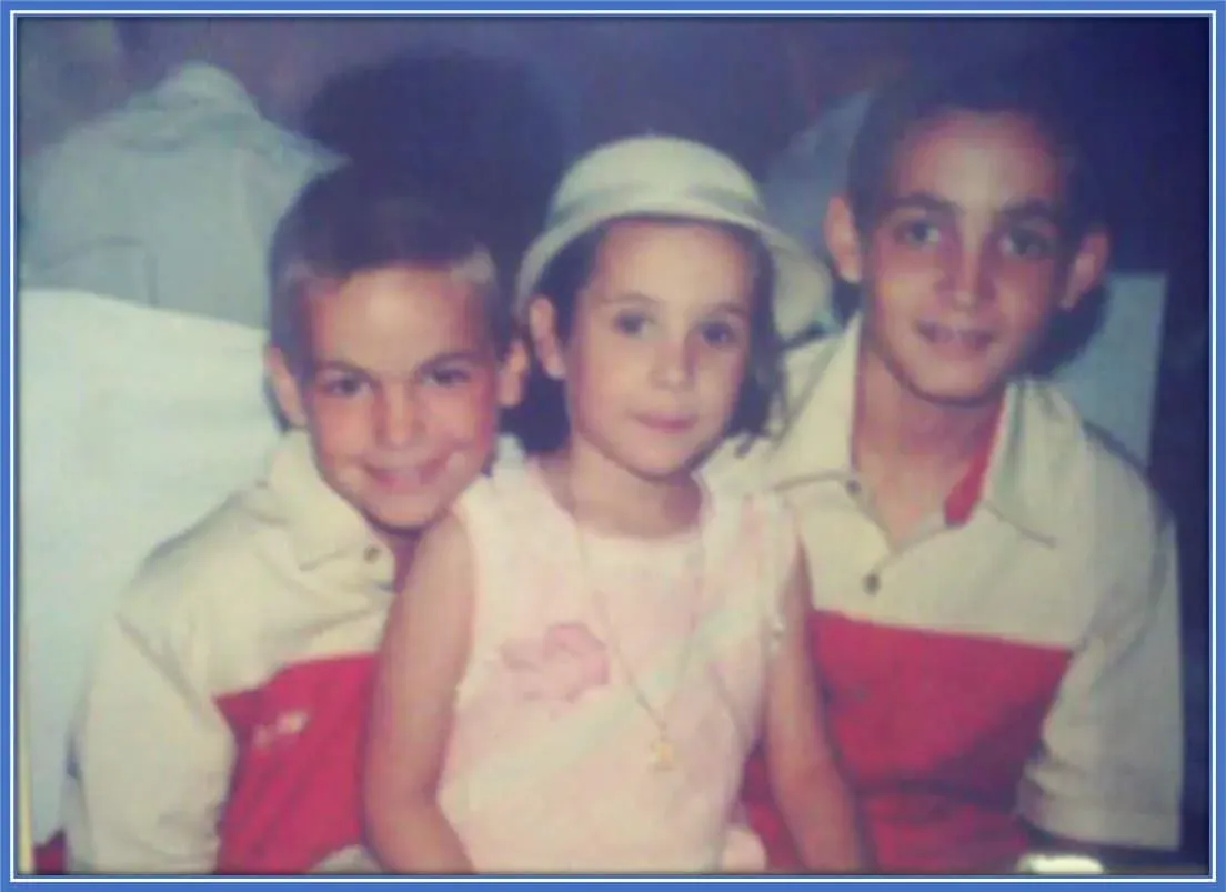 Meet the athlete and his children. Fabian is at the left, Yamila at the centre, and Alejandro at the right.