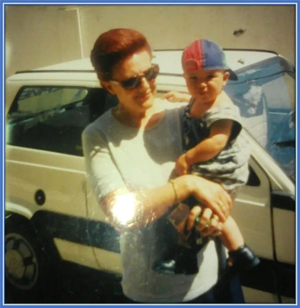 A rare childhood photo of Pedro Porro in the arms of his grandmother.